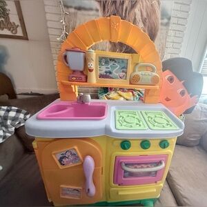 Vibrant vintage 2004 DORA Play Kitchen Set with Pink Sink and Yellow Oven
